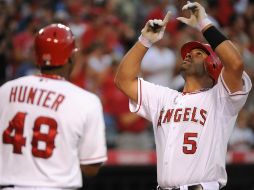Albert Pujols (d) es octavo en la lista de jonrones de la Liga Americana.  /
