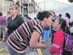 La ZMG recuperó ayer el escenario urbano que le es característico: congestionamientos viales,prisas y bullicio en los centros escolares  /