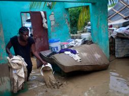 Más de 14 mil personas debieron evacuar sus hogares en Haití debido a las inundaciones. AP  /