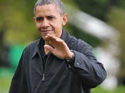 El presidente de EU, Barack Obama, cuenta con el apoyo del ex gobernador republicano de Florida Charlie Crist. AFP  /