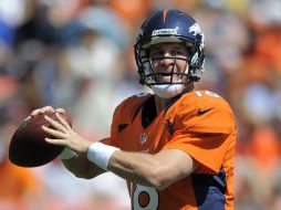 La actuación de Manning fue magnífica, al completar 10 de 12 envíos para 122 yardas . AP  /