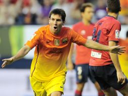El argentino Lionel Messi en el juego del Barcelona y Osasuna. AP  /