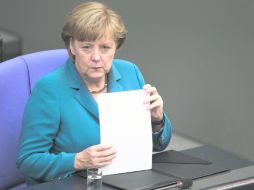 Pese a que la canciller se ha ganado el respeto por su mano dura, tiene una aceptación de 79% entre los alemanes. AP  /