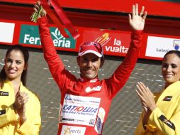 Joaquim ''Purito'' Rodríguez celebra en el podio su actuación en la etapa 16 de la Vuelta a España. REUTERS  /