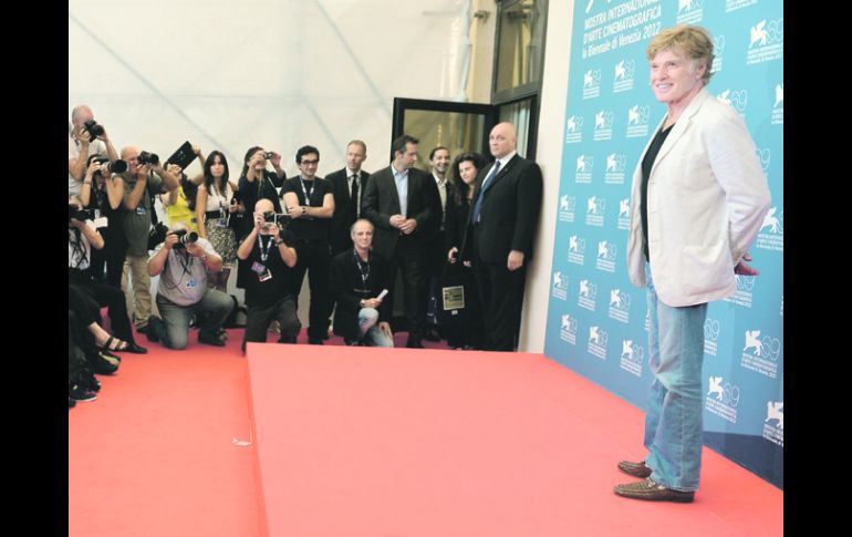 Convence. El más reciente trabajo de Redford ha obtenido buenas críticas a su paso por el festival que se desarrolla en Venecia. AFP  /
