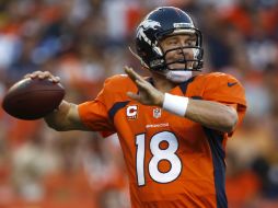 El mayor de los hermanos Manning realizó un gran partido al completar 19 de 26 pases para 253 yardas. AP  /