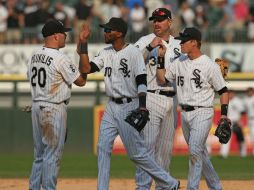 Jugadores de los Medias Blancas de Chicago celebra la victoria sobre los Tigres de Detroit. AFP  /