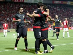Jugadores del Atlético de Madrid festejan su triunfo. AP  /