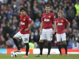 El Manchester United no supo aprovechar su condición de local y dejo ir la victoria. AP  /