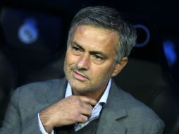 José Mourinho tiene ganas de volver a Inglaterra, pero antes cumplirá seis temporadas en el Real Madrid. AP  /