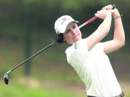 Mejora. Lorena Ochoa subió seis lugares en la tercera jornada, comenzó el día en el puesto 25. AP  /