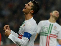 El delantero luso se lamenta tras fallar una oportunidad de gol ante Rusia. AFP  /