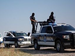 Autoridades policiacas activaron la alarma tras detonaciones de arma, un vehículo incendiado y un asesinato. ARCHIVO  /