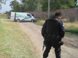 Agentes de la Procuraduría de Estado realiza las indagatorias en los asesinados. ESPECIAL  /