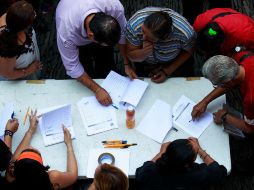 Empleados sindicalizados analizaban impedir la última sesión de los diputados, pero finalmente optaron por laborar bajo protesta.  /