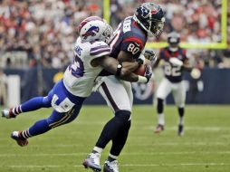 Andre Johnson captura un pase durante el partido. AP  /