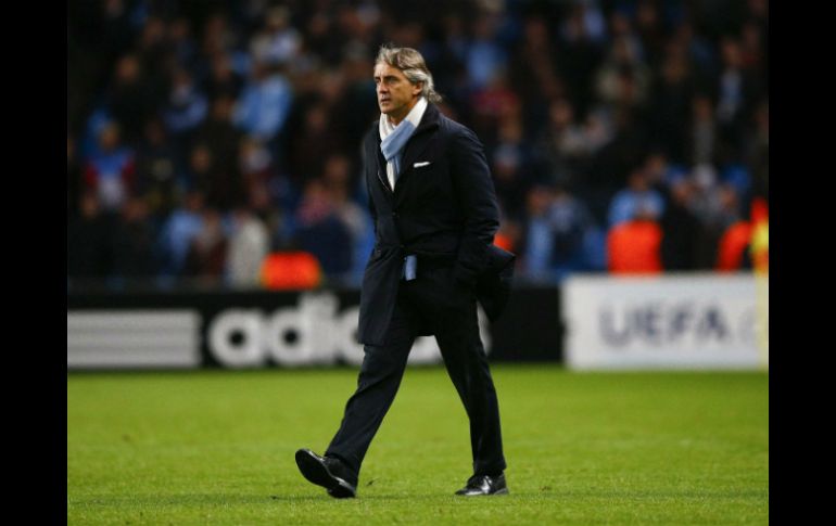 El estratega considera que el empate de ayer ante el Ajax acaba con la oportunidad de su equipo de clasificar a octavos. ARCHIVO  /