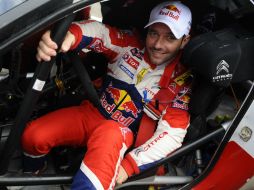 Loeb se sitúa como máximo aspirante a la victoria tras haber alcanzado el liderato en el segundo tramo del día (El Priorat 1). AP  /
