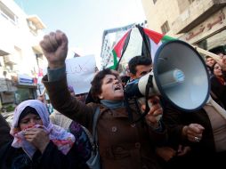 Palestinos encabiezan una protesta contra los ataques de Israel a la zona. XINHUA  /