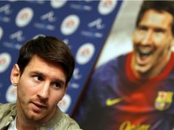 Si Messi no gana el Balón de Oro 2012, le gustaría que Xavi o Iniesta lo hicieran. EFE  /