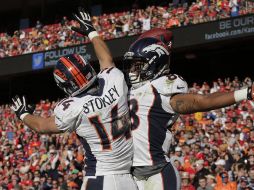 Los jugadores de los Broncos de Denver celebran luego de una anotación de su equipo. AP  /