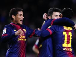 Jonathan dos Santos (izq) tuvo participación con el cuadro catalán. AP  /