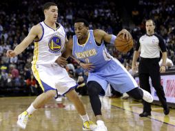 Iguodala anotó el triple con el que los Warriors ganaron el partido. AP  /