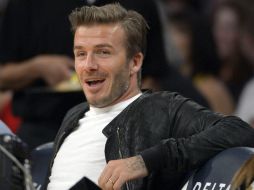 El centrocampista observa el partido bajo la mirada de los asistentes. AP  /