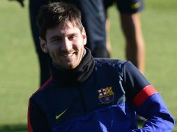 El argentino durante su entrenamiento de hoy en Barcelona. AP  /