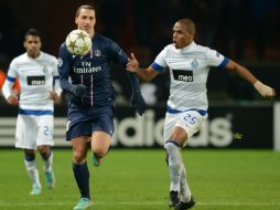 El Grupo A quedó liderado por el club parisino con 15 puntos seguido del Porto con 12. AFP  /