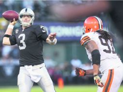 Carson Palmer ha tenido buenas estadísticas, pero sufre muchas intercepciones en momentos claves. ZUMA PRESS  /