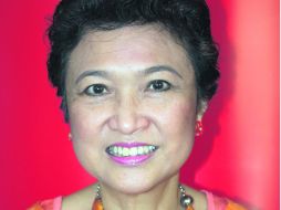 Imelda M. Nicolás.  Presidenta de la Comisión de Filipinos en el Extranjero.  /