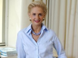 Las fotos tomadas por Carolina Herrera (foto) y otros diseñadores serán subastadas en Nueva York el próximo 17 de diciembre. ARCHIVO  /