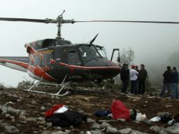 Aeronáutica y Protección Civil esperan a que baje la intensidad de la neblina para continuar con la búsqueda de la caja negra. XINHUA  /