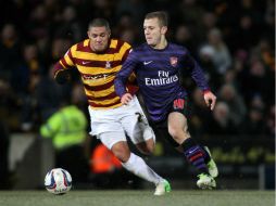 Garry Thompson anotó para Bradford y Thomas Vermaelen para Arsenal.  /