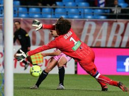 La portería de Memo Ochoa fue vulnerada en tres ocasiones. AFP  /