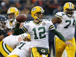 Aaron Rodgers lanzó los tres pases a touchdown del partido. REUTERS  /