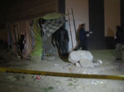 Elementos del IJCF se hizo cargo del levantamiento del cadáver para trasladarlo a la morgue.  /