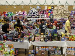 Recibieron miles de juguetes donados por individuos, organizaciones y jugueterías. AP  /