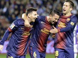 Jugadores del Barcelona celebran el gol de Messi.ESPECIAL ZUMAPRESS  /