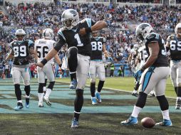 Cam Newton (1) fue la estrella de la ofensiva de las Panteras. AP  /