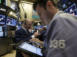 Los mercados están pendientes, tras el receso navideño. AP  /