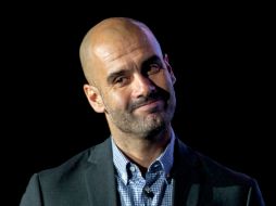 Josep Guardiola sería el candidato ideal para remplazar al escocés Alex Ferguson. ARCHIVO  /