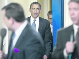 El gesto de Barack Obama delata que el debate sobre el tema fiscal no prospera lo deseado y el tiempo se acaba.EFE  /