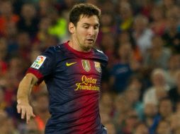 Lionel Messi rompió el récord de goles anotados en un año al marcar 91 ocasiones. ARCHIVO  /