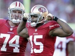 Michael Crabtree (d) terminó con ganancia de 172 yardas, la mayor cantidad en su carrera. AP  /