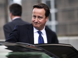 El primer ministro británico espera que el G-8 asegure un papel de liderazgo  capaz de facilitar acuerdos comerciales. ARCHIVO  /