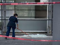 Los disturbios del pasado 1 de diciembre dejaron destrozos en comercios. ARCHIVO /