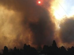 Humareda provocada por uno de los devastadores incendios en Tasmania. EFE  /