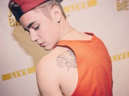 Justin Bieber publicó en sus redes una fotografía de su nuevo tatuaje. ESPECIAL /